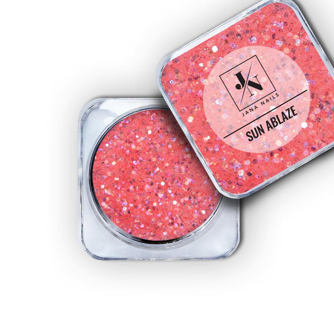 Sparkling Glitters Set in Sun Ablaze coral shades packaging with shimmering effect.