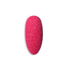 Neon red/pink sugar powder with sparkling effect.